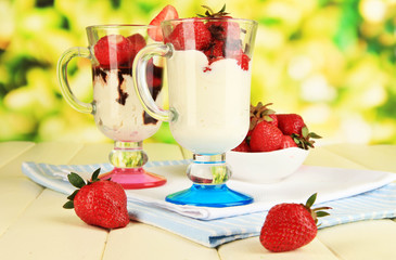 Delicious strawberry desserts in glass vase