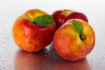 Peaches on metal background