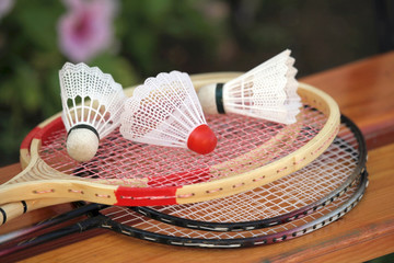 Badminton rackets and shuttlecocks.