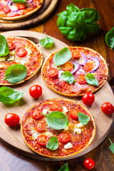 Traditional pizza with mozzarella and salami