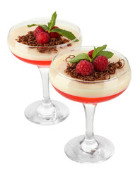 fruit jelly with chocolate and raspberries in glasses isolated