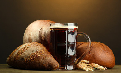 tankard of kvass and rye breads with ears,