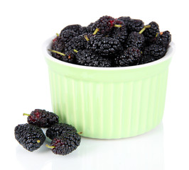 Ripe mulberries in bowl isolated on white
