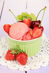 Delicious  ice cream with fruits and berries in bowl