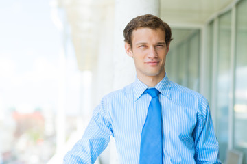 successful young businessman smiling