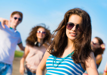 stylish young woman in sunglasses