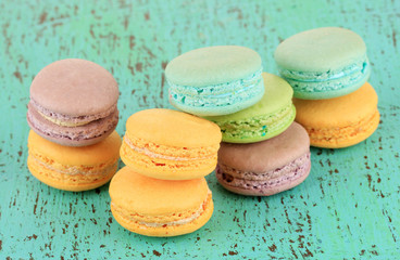 Macaroons on wooden table close-up