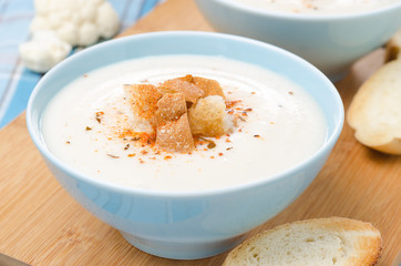 cold cauliflower soup with cottage cheese in a bowl