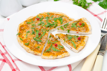 sliced ​​chicken pizza with tomato sauce, cheese, greens