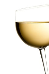 glass of white wine tilted with space for text