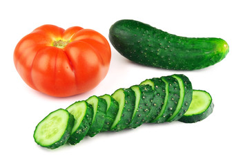 Tomato and cucumber isolated on white background