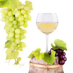 grapes and wine glass on a wooden vintage barrel