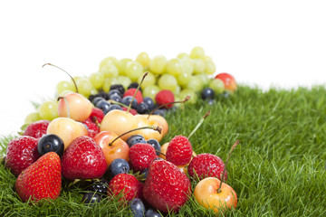 A grass mat with a fruit frame.