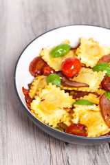 Ravioli with ricotta, tomatoes and basil