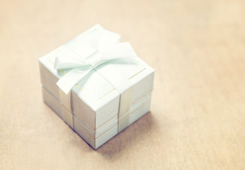 Gift box with white ribbon
