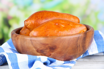 Fresh baked pasties, in wooden bowl,