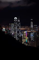 Elevated view of Hong Kong skyscrapers lit up at night