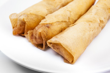 Spring rolls-Dim sum,Loempia,cuisine on white background