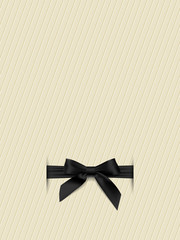 Textured background with a black bow