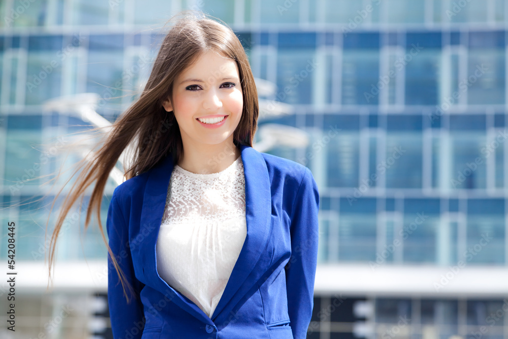 Sticker smiling young businesswoman outdoor