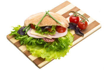 Bread with sausages and salad