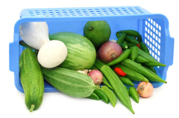 Fresh vegetables from a plastic basket