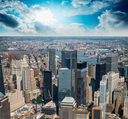 Helicopter view at sunset of Lower Manhattan skyscrapers