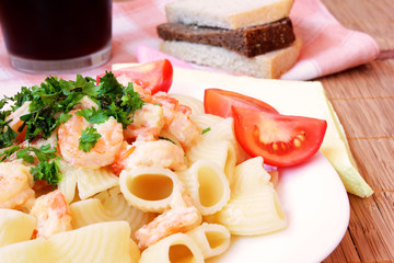 delicious pasta with shrimps, cheese and sour cream sauce