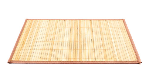 Bamboo straw serving mat isolated