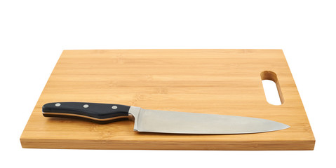 Steel kitchen knife on cutting board