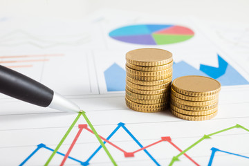 Coins on a financial chart