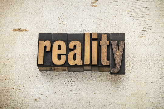 reality word in wood type