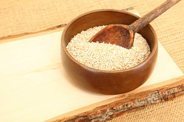 Bowl of Raw Oatmeal in Wooden Bowl