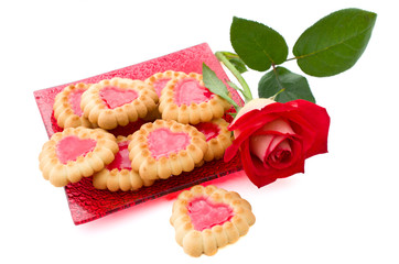 Heart-shaped cookies and rose