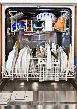 modern home dishwashing machine appliance showing open