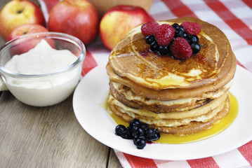 Pile of pancakes in the white plate
