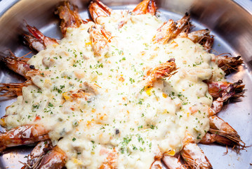Baked shrimps with cheese for buffet.
