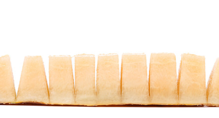 Row melon slices on a white background
