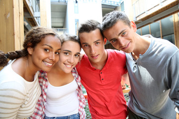 Portrait of cheerful students in college campus