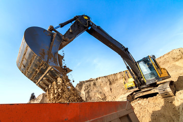 Excavator Loading Dumper Truck