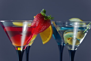cocktails garnished with fruits