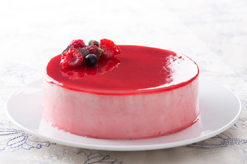 Red fruits mousse on a dish