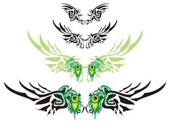 Wings in the form of the horse head and green monster eyes