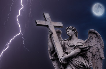 Bernini's marble statue of angel with cross. Rome, Italy