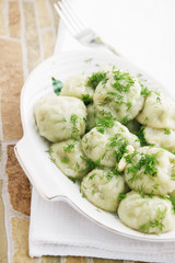 Cooked ravioli with dill