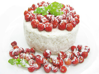 dairy pudding dessert with wild strawberry berries