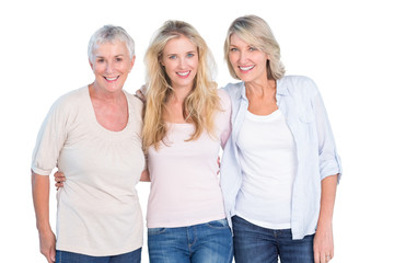 Obraz premium Three generations of women smiling at camera