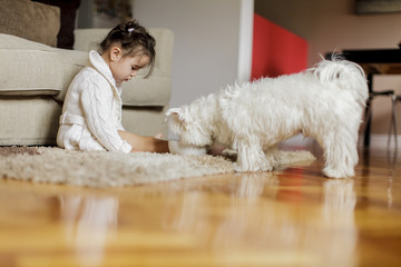 Little girl with a dog