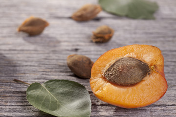 apricot on old wooden plank - close up