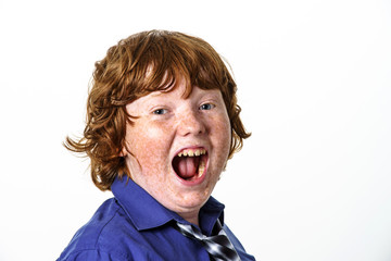 Obraz na płótnie Canvas Freckled red-hair boy